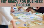 multiple people handling post-its on a table