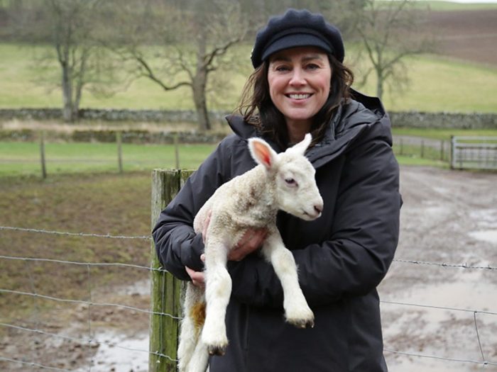 Jill Halfpenny holding a lamb